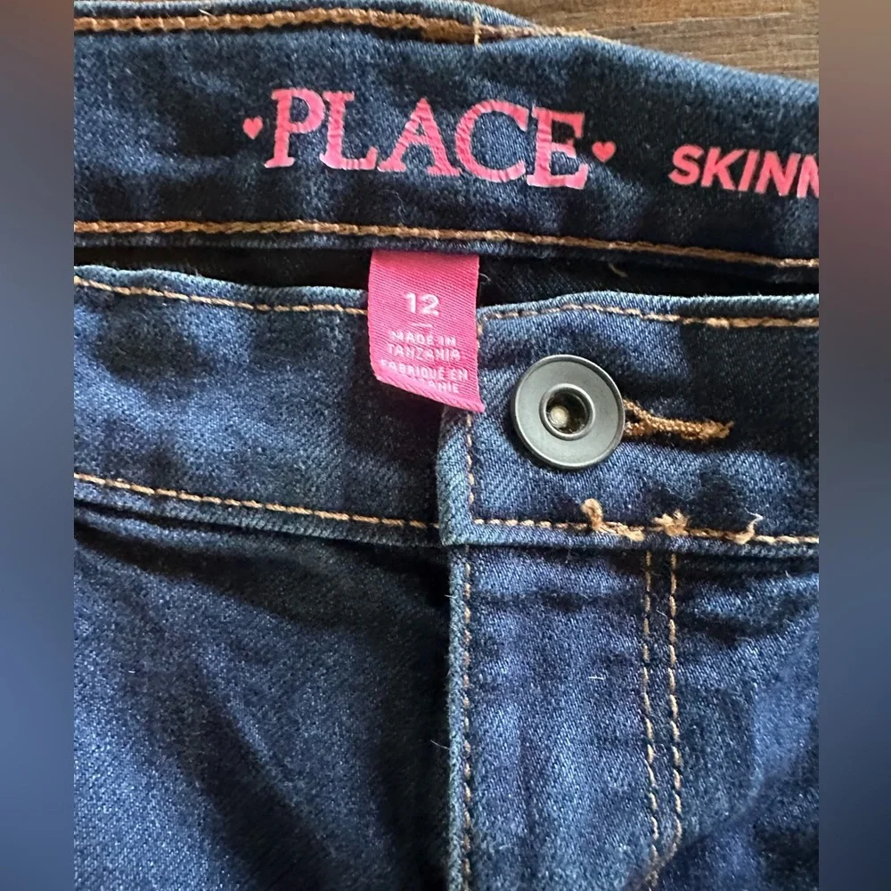 The Children’s Place girls jeans size 12. medium wash and dark wash 2 pairs!